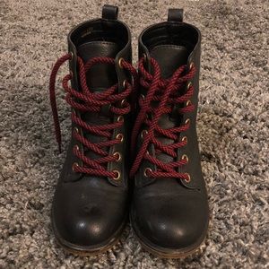 black boots red shoe strings